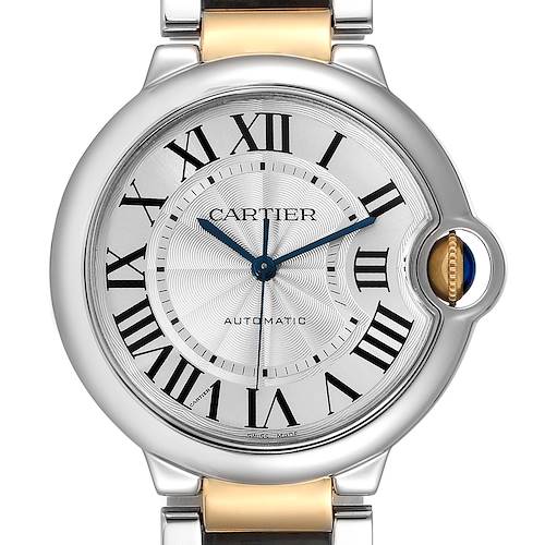 The image showcases a front view of the Cartier Ballon Bleu W2BB0012 Men's Steel and Gold (two tone) Silver Dial W2BB0012 Men's Steel and Gold (two tone) Silver Dial watch, highlighting its dial, Roman numerals, and crown.