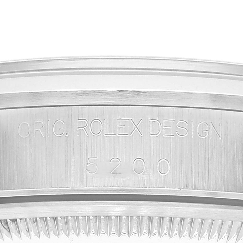 This image shows a close-up view of the engraved side of the bezel of a Rolex Date 15200 Men's Stainless Steel Black Dial 15200 Men's Stainless Steel Black Dial model watch.