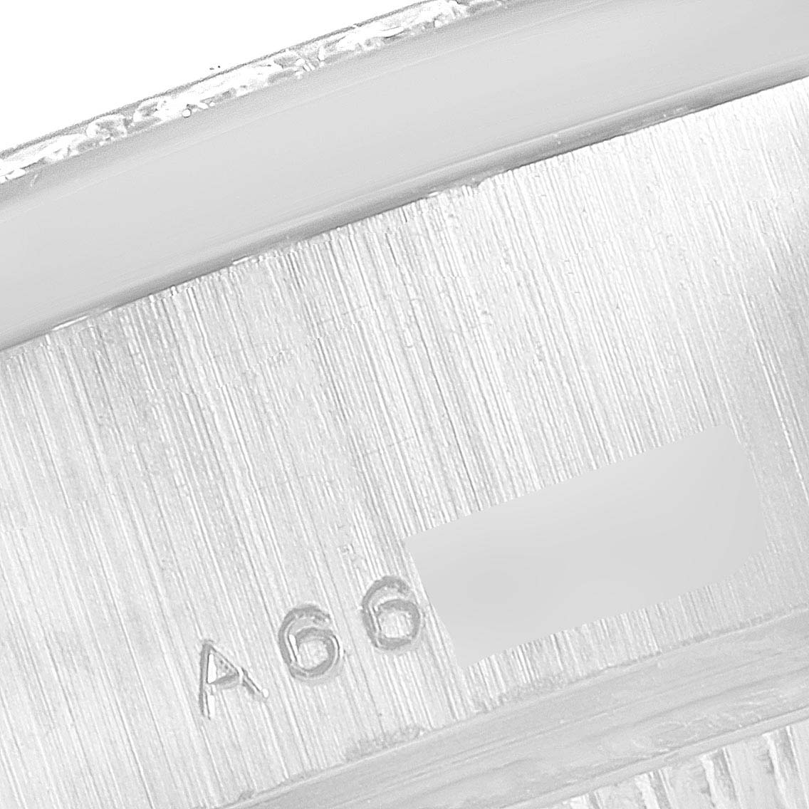 This close-up image shows the caseback engraving of a Rolex President 79159 Women's White Gold Champagne Dial 79159 Women's White Gold Champagne Dial model watch.