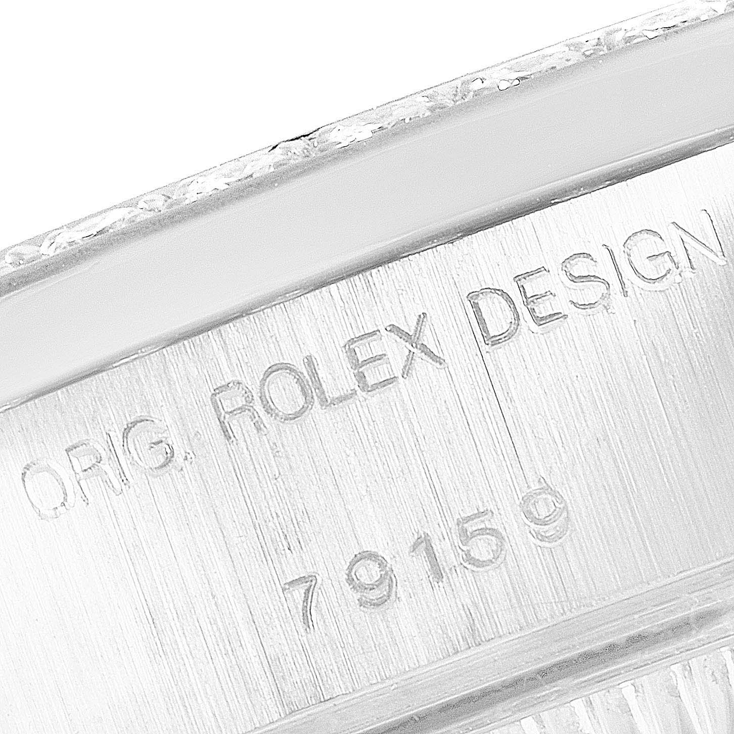 The image shows a close-up angle of the Rolex President 79159 Women's White Gold Champagne Dial 79159 Women's White Gold Champagne Dial model's case, displaying the engraved text "ORIG. ROLEX DESIGN 79159".