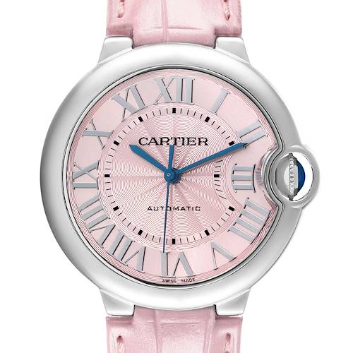 The Cartier Ballon Bleu WSBB0007 Women's Stainless Steel Pink Dial watch is shown from a front view, highlighting its pink dial, Roman numerals, blue hands, and a pink strap.