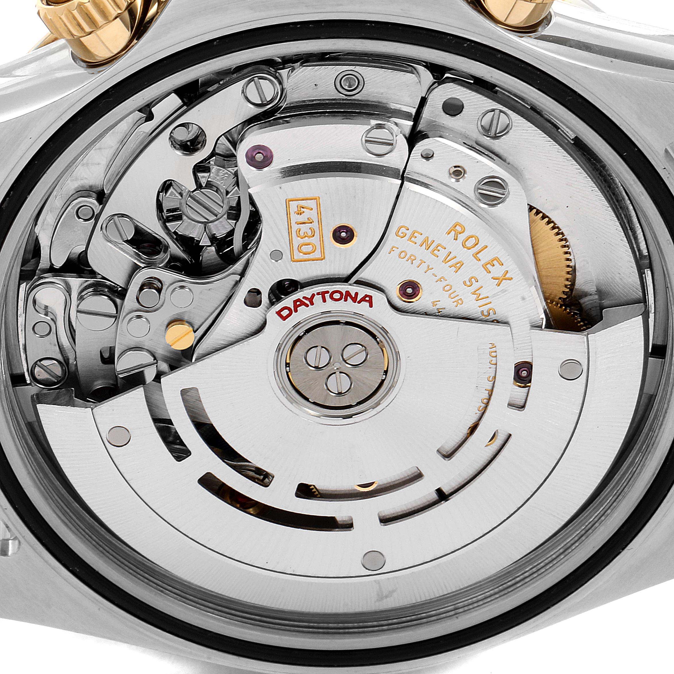 The image shows a close-up view of the internal movement and components of a Rolex Daytona 116523 Men's Steel and Gold (two tone) Mother of Pearl Dial 116523 Men's Steel and Gold (two tone) Mother of Pearl Dial watch.