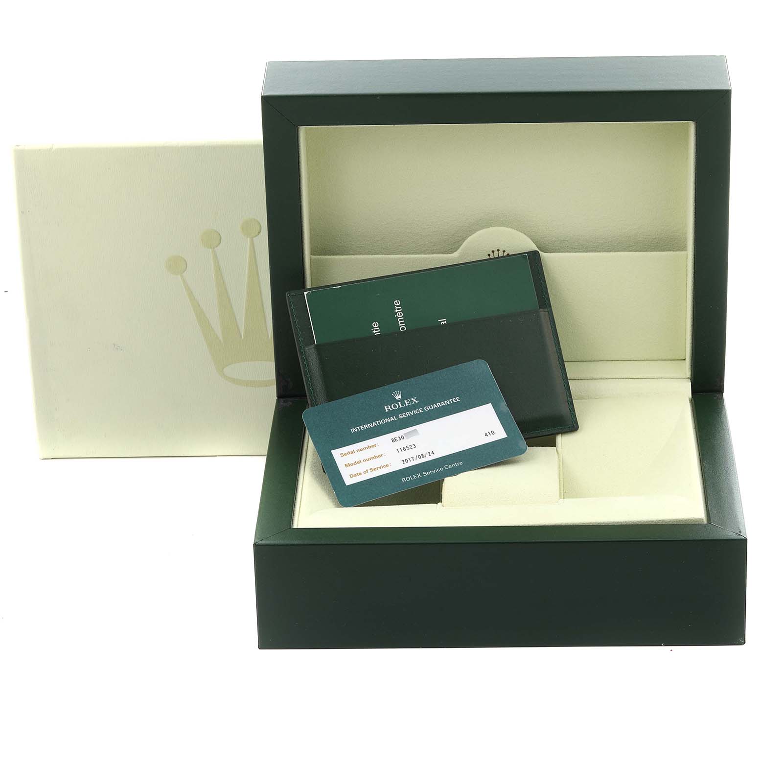 The image shows a Rolex Daytona 116523 Men's Steel and Gold (two tone) Silver Dial 116523 Men's Steel and Gold (two tone) Silver Dial watch box with warranty cards and booklets inside, viewed from the front.