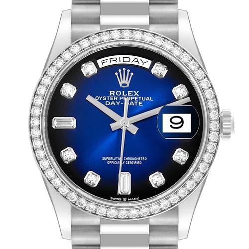 The image shows a front view of a Rolex President 128349 Men's White Gold Blue Dial 128349 Men's White Gold Blue Dial watch, highlighting the face, bezel, and part of the bracelet.