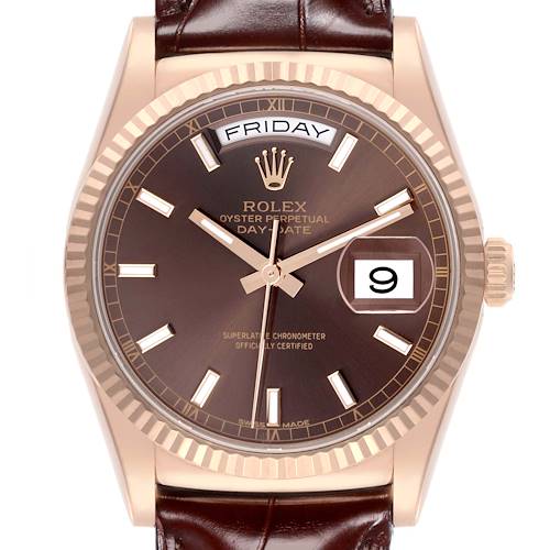The Rolex President 118135 Men's Rose Gold Brown Dial 118135 Men's Rose Gold Brown Dial model watch is shown from the front, displaying its face, bezel, day, and date features.
