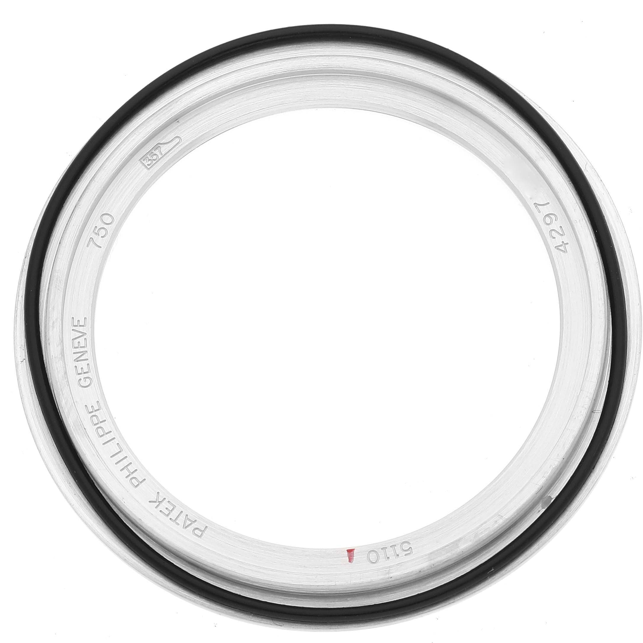 The image shows the bezel of a Patek Philippe Complications 5110G Men's White Gold Silver Dial 5110G Men's White Gold Silver Dial watch from a top-down angle.