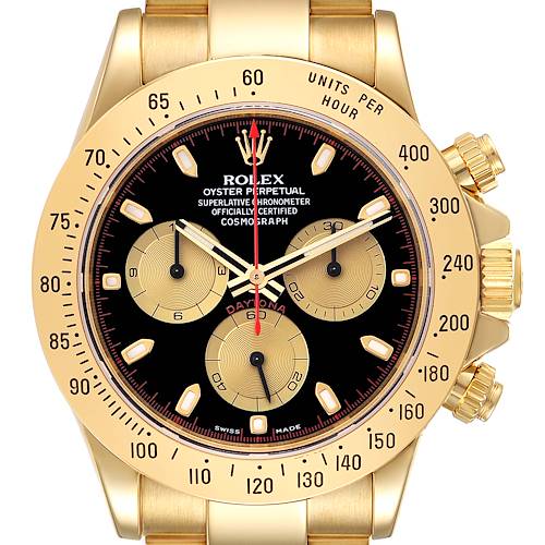 The Rolex Daytona 116528 Men's Yellow Gold Black Dial 116528 Men's Yellow Gold Black Dial watch is shown from a front angle, highlighting its dial, bezel, and chronograph sub-dials.