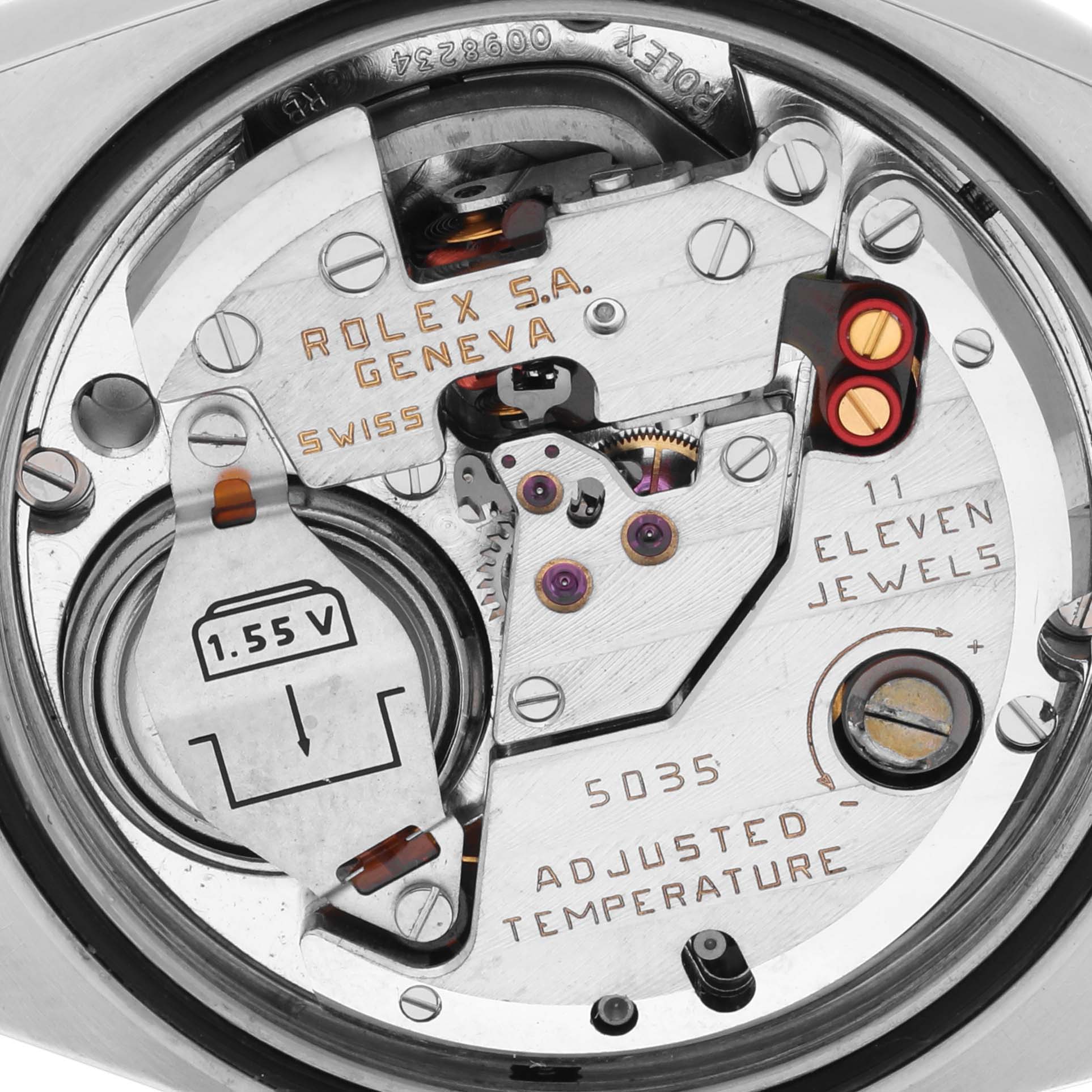The image shows the movement and internal parts of the Rolex Oysterquartz 17013 Men's Steel and Gold (two tone) Silver Dial 17013 Men's Steel and Gold (two tone) Silver Dial watch, highlighting its mechanism and battery.