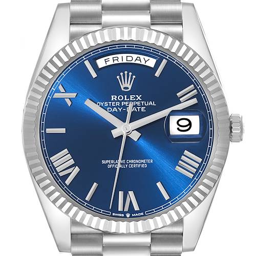 The image shows a close-up of the Rolex President 228236 Men's Platinum Blue Dial 228236 Men's Platinum Blue Dial model watch, highlighting its dial, day-date display, and fluted bezel.