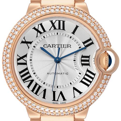 The image shows a close-up of the Cartier Ballon Bleu WE9005Z3 Men's Rose Gold Silver Dial WE9005Z3 Men's Rose Gold Silver Dial watch face, highlighting the dial with Roman numerals, blue hands, and a diamond bezel.