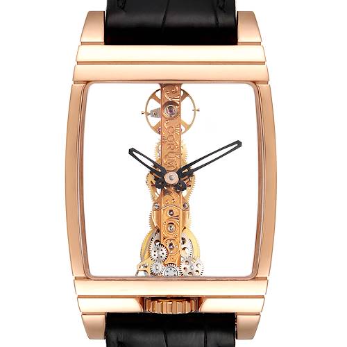 The image shows a close-up, front view of the Corum Golden Bridge B113/01043 - 113.160.55/0002 0000 Men's Rose Gold Transparent Dial B113/01043 - 113.160.55/0002 0000 Men's Rose Gold Transparent Dial watch, highlighting its intricate internal mechanics and rectangular case.