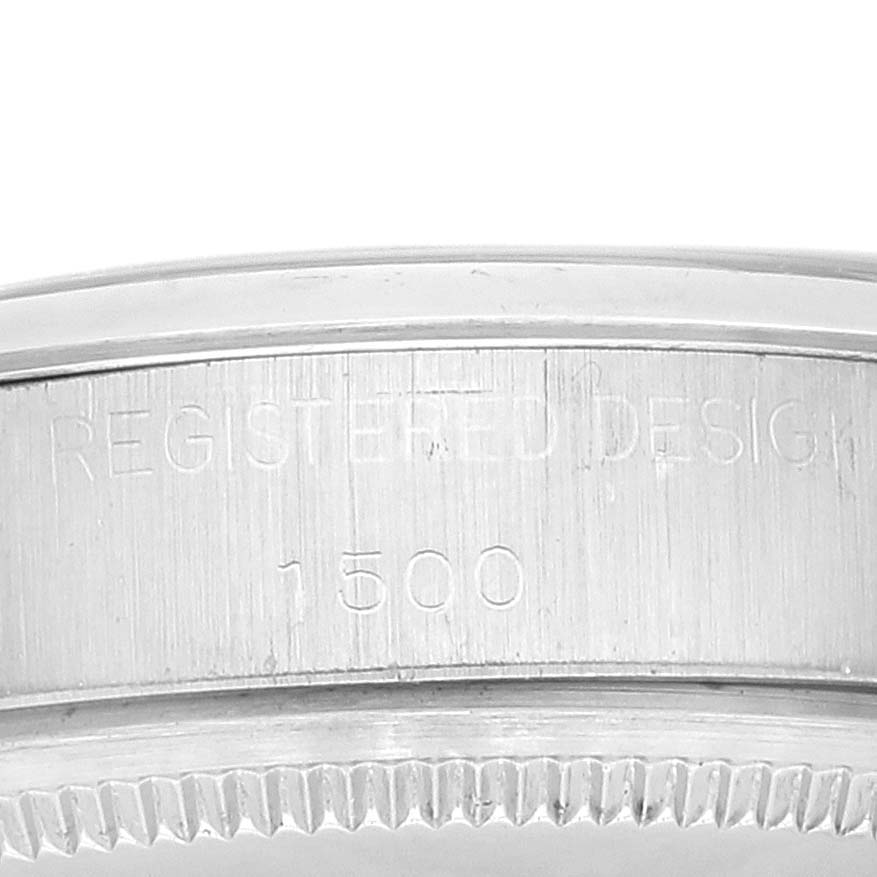 This image shows the engraved case back of a Rolex Date 1500 Men's Stainless Steel Silver Dial 1500 Men's Stainless Steel Silver Dial model watch with "REGISTERED DESIGN" and the number "1500" visible.