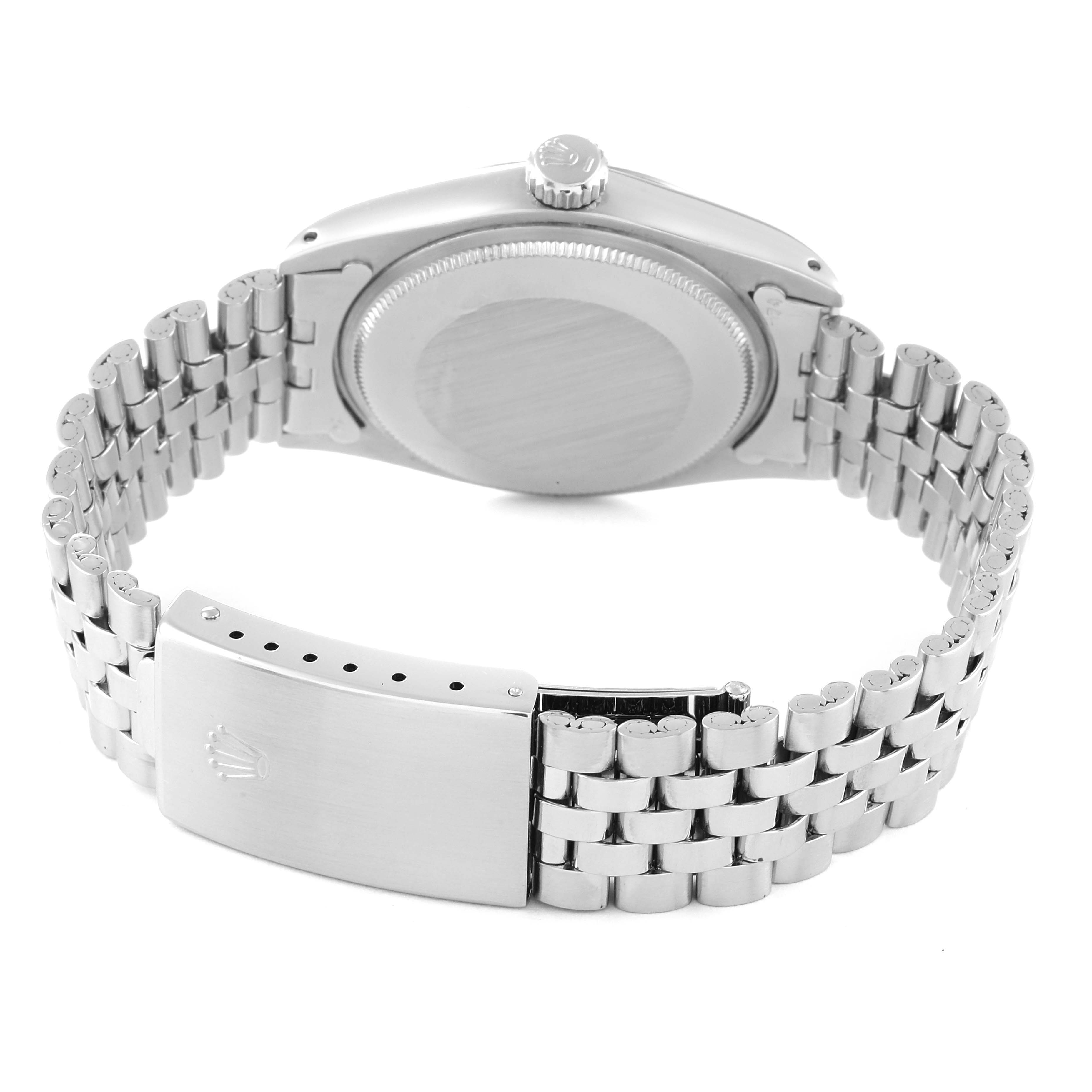 This image shows the back view, case back, crown, and bracelet clasp of a Rolex Date 1500 Men's Stainless Steel Silver Dial 1500 Men's Stainless Steel Silver Dial model watch.