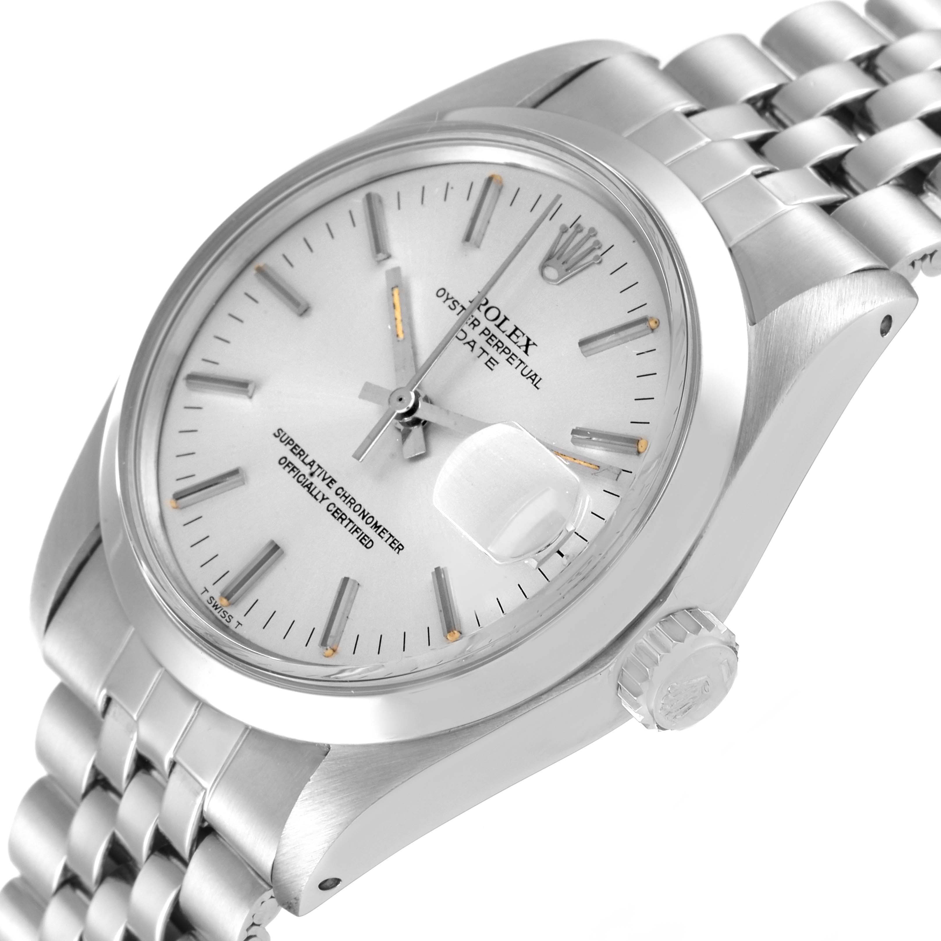 The image shows a side angle view of the Rolex Date 1500 Men's Stainless Steel Silver Dial 1500 Men's Stainless Steel Silver Dial model, highlighting the face, clasp, and crown.