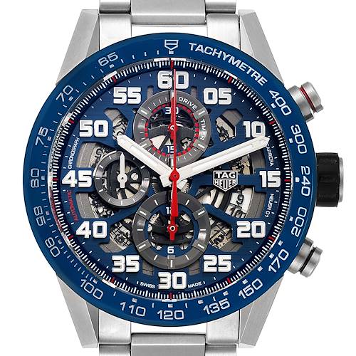 The image shows the face of a Tag Heuer Carrera CAR2A1K.BA0703 Men's Stainless Steel Blue Dial CAR2A1K.BA0703 Men's Stainless Steel Blue Dial watch from a front angle, highlighting its tachymeter scale and chronograph sub-dials.