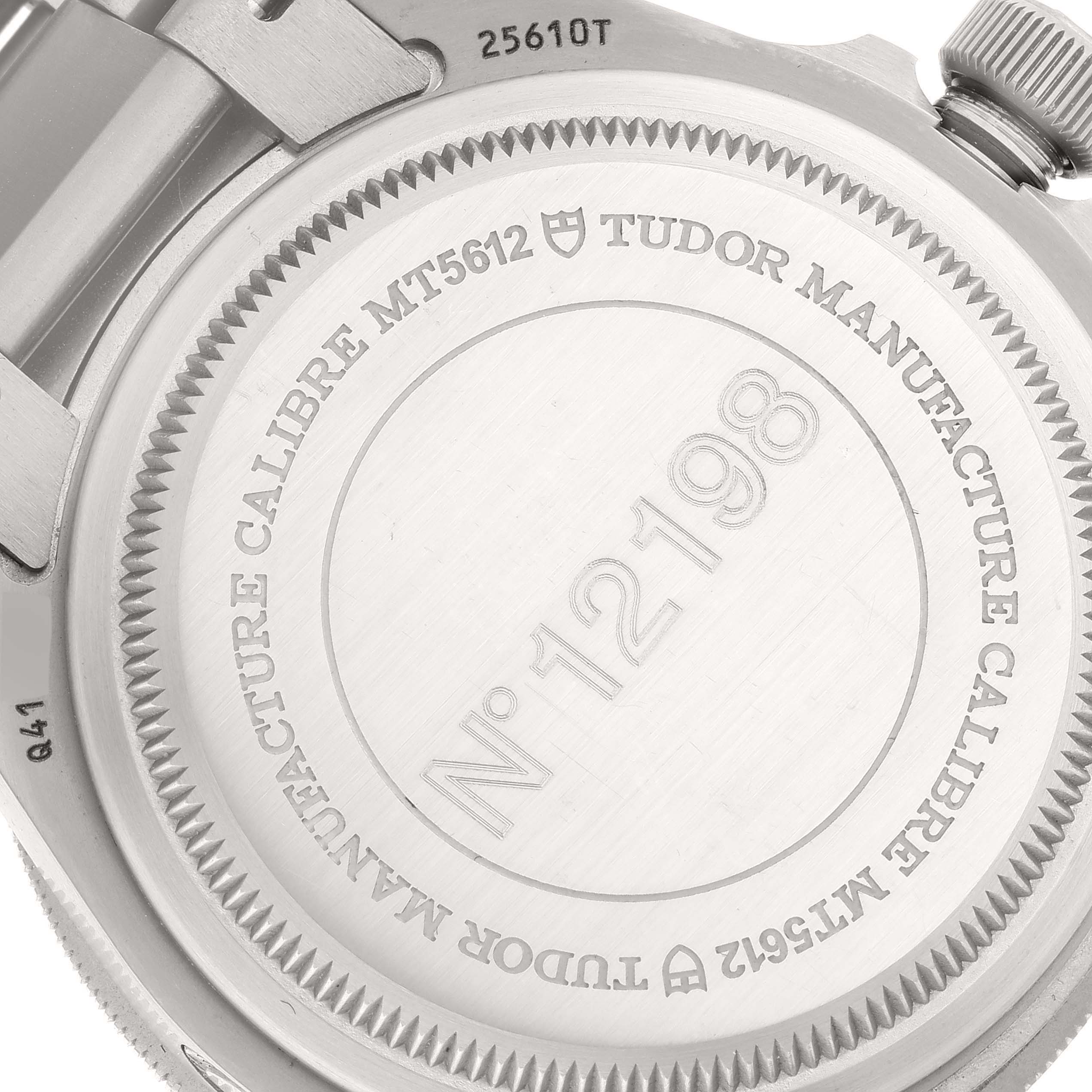 This is a close-up view of the case back of a Tudor Pelagos 25610TNL Men's Titanium Black Dial 25610TNL Men's Titanium Black Dial watch, showing the serial number and engraved details.