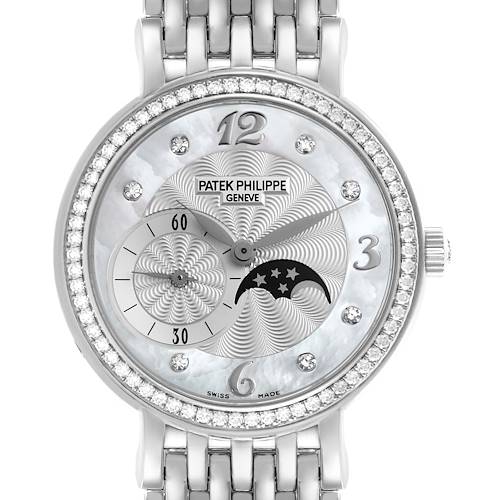 The Patek Philippe Calatrava 4958/1G-001 Women's White Gold Silver Dial 4958/1G-001 Women's White Gold Silver Dial watch is shown front-facing, highlighting its dial, bezel with diamonds, and part of the bracelet.