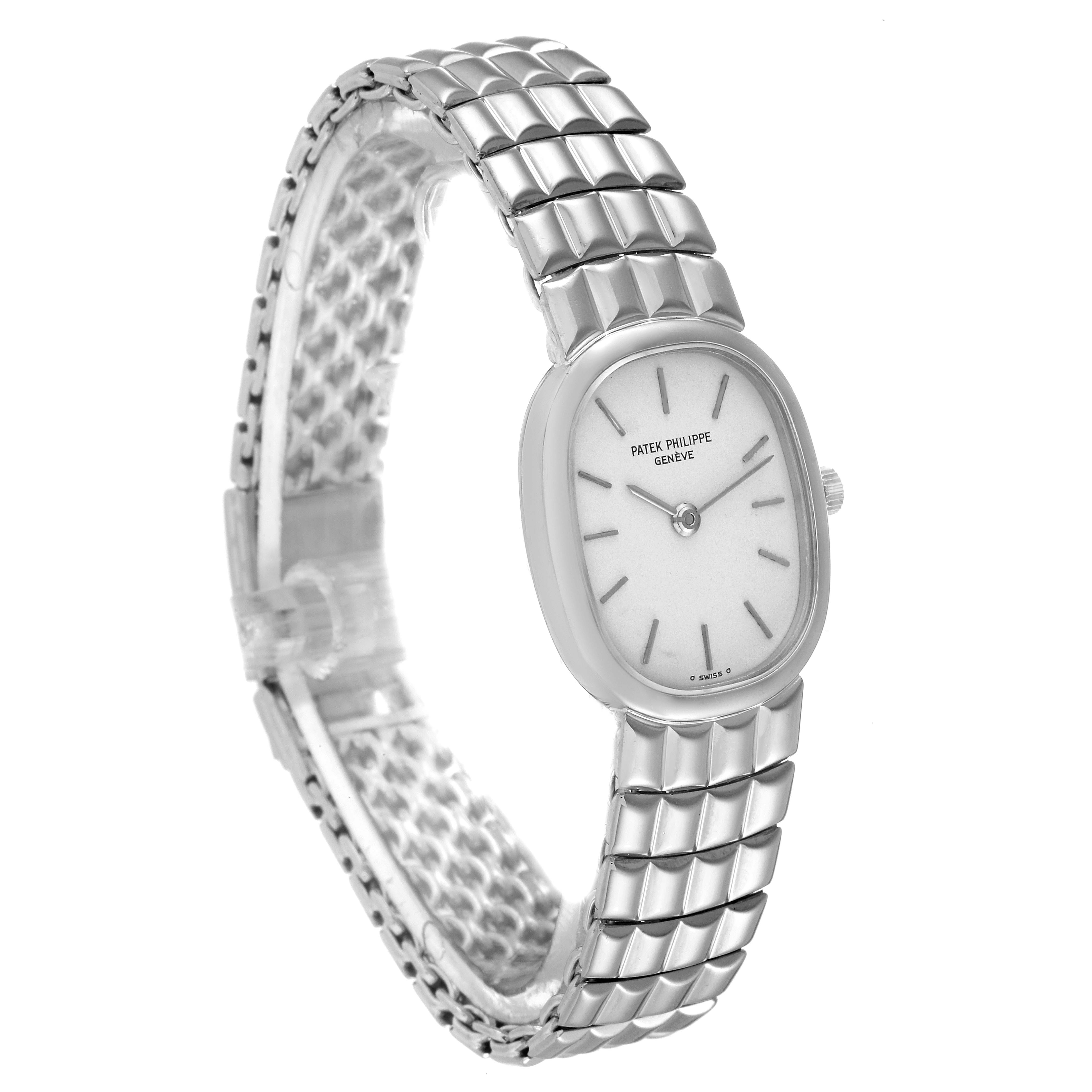The image shows a side angle view of the Patek Philippe Golden Ellipse 4764/15 Women's White Gold Silver Dial 4764/15 Women's White Gold Silver Dial watch, highlighting its dial, case, and metal bracelet.