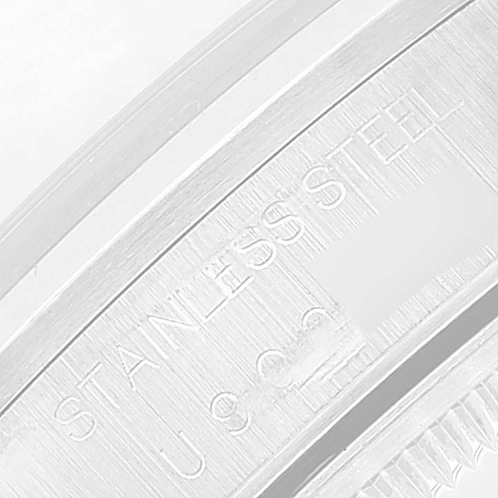 This close-up shows the inner rim with "STAINLESS STEEL" engraved on the Rolex Date 15200 Men's Stainless Steel Black Dial 15200 Men's Stainless Steel Black Dial model watch.