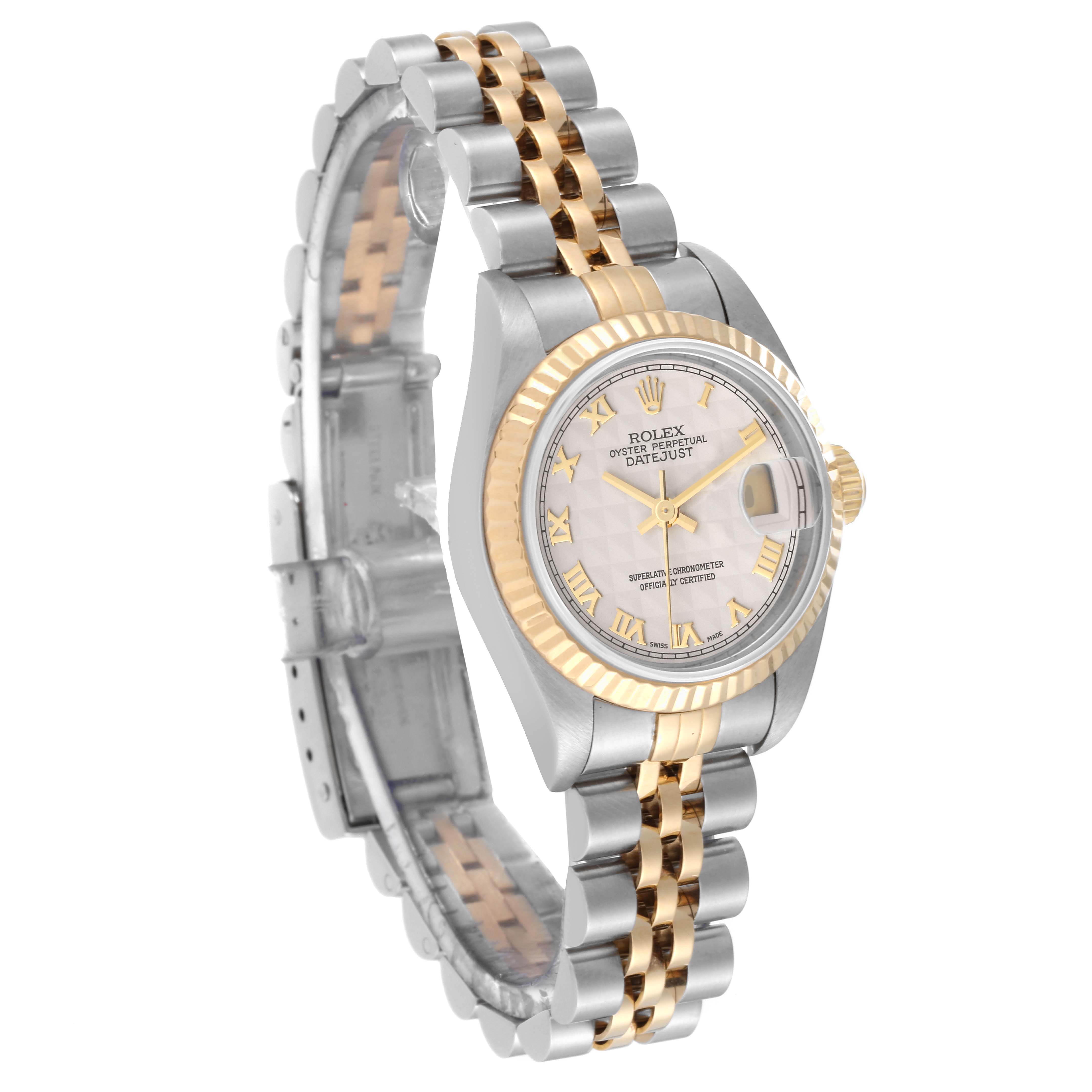 This image shows a Rolex Datejust 79173 Women's Steel and Gold (two tone) Beige Dial 79173 Women's Steel and Gold (two tone) Beige Dial watch at a slight angle, highlighting its face, bezel, crown, and two-tone bracelet.