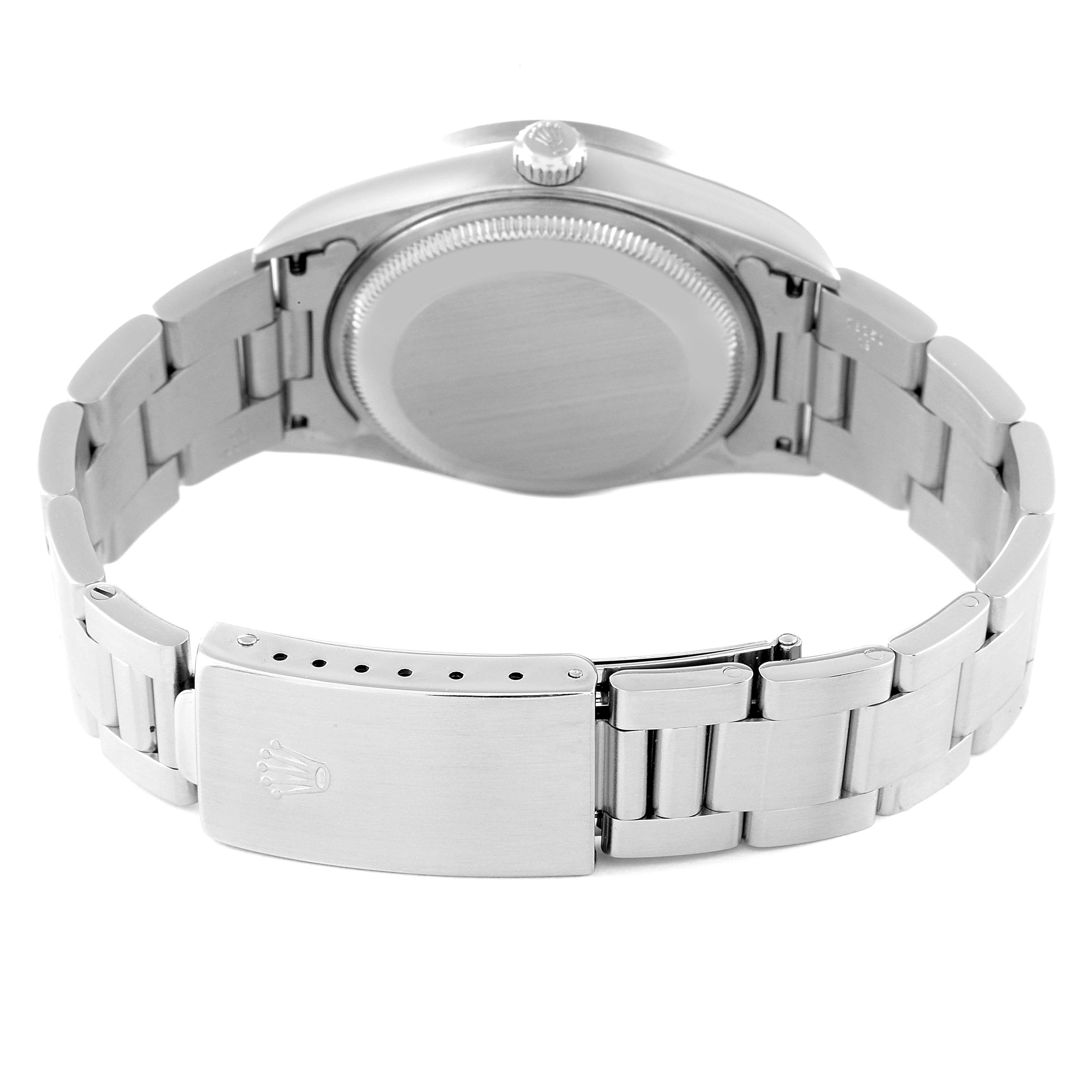 The image shows the back case and clasp of a Rolex Date 15210 Men's Stainless Steel Blue Dial 15210 Men's Stainless Steel Blue Dial model watch from a rear angle.