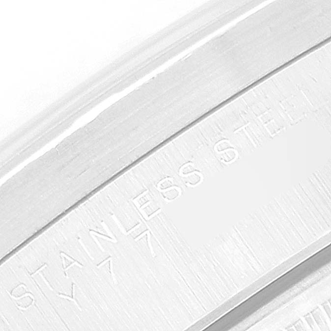 The image shows a close-up of the stainless steel case back of the Rolex Date 15210 Men's Stainless Steel Blue Dial 15210 Men's Stainless Steel Blue Dial model watch.