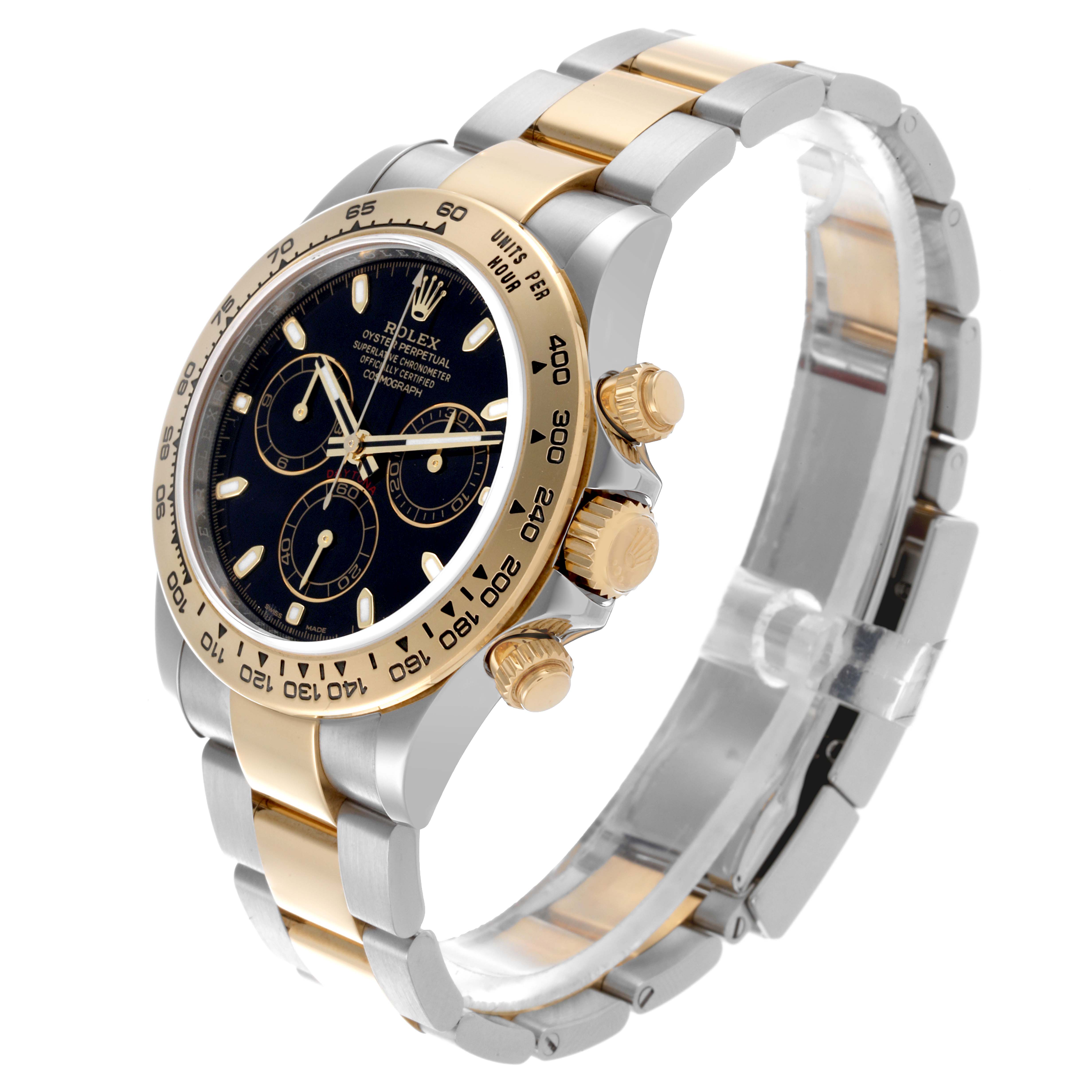 The Rolex Daytona 116503 Men's Steel and Gold (two tone) Black Dial 116503 Men's Steel and Gold (two tone) Black Dial is displayed at a three-quarter angle showing its bezel, dial, band, and side pushers.