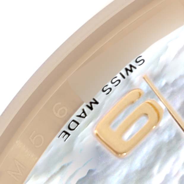 The image shows a close-up of the dial edge and number "6" on a Rolex President 118208 Men's Yellow Gold Mother of Pearl Dial 118208 Men's Yellow Gold Mother of Pearl Dial watch, emphasizing "SWISS MADE."