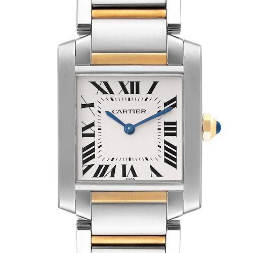 This image shows a close-up of the Cartier Tank Francaise W51006Q4 Women's Steel and Gold (two tone) Silver Dial W51006Q4 Women's Steel and Gold (two tone) Silver Dial watch face and part of the bracelet, highlighting the Roman numerals and blue hands.