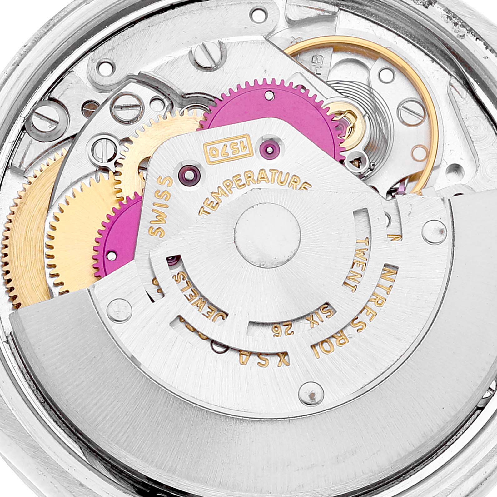 The image shows a close-up of the inner movement mechanisms of a Rolex Date 1501 Men's Stainless Steel Black Dial 1501 Men's Stainless Steel Black Dial model watch, highlighting gears and components.