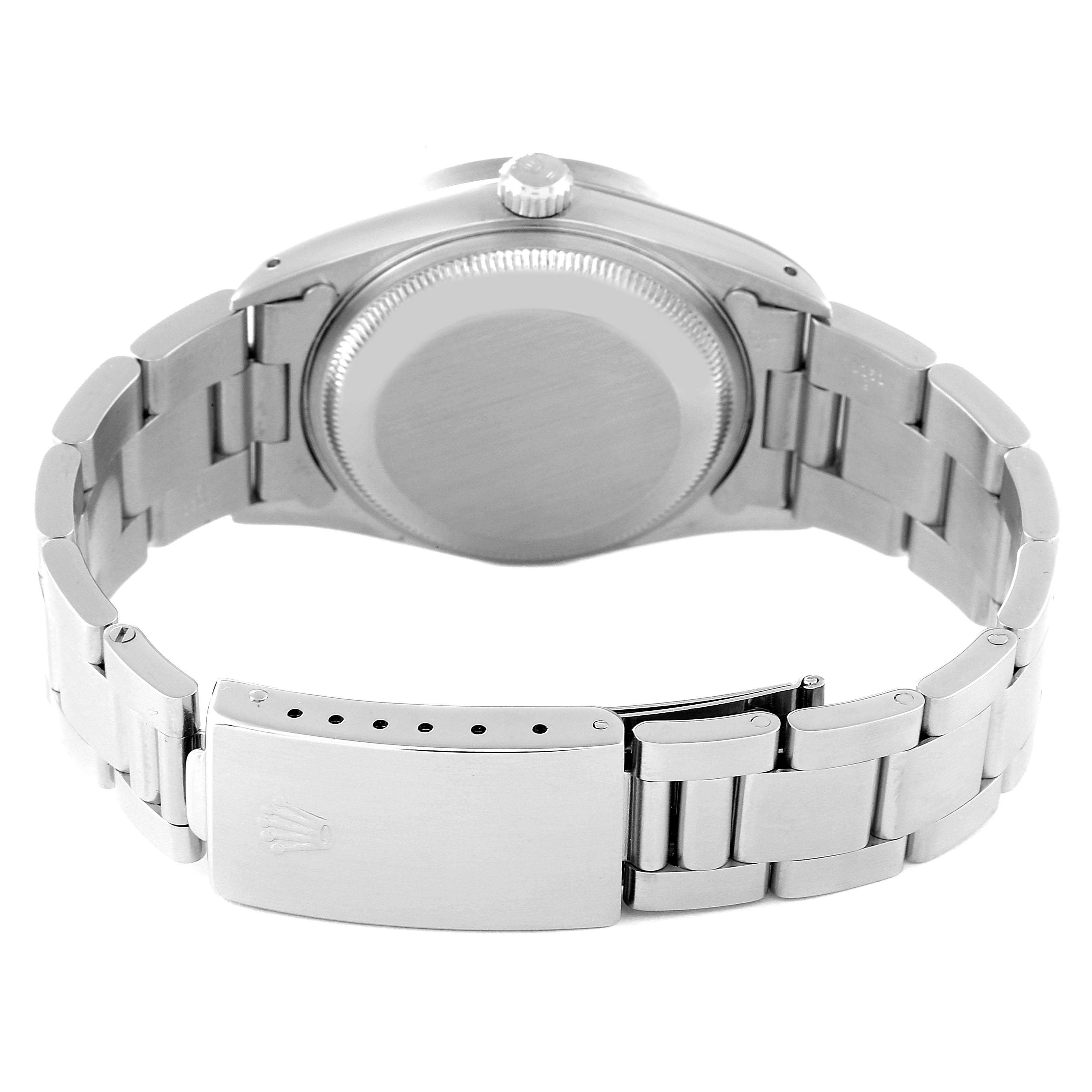 This image shows the case back, crown, and bracelet clasp of a Rolex Date 15210 Men's Stainless Steel White Dial 15210 Men's Stainless Steel White Dial model watch from a rear angle.