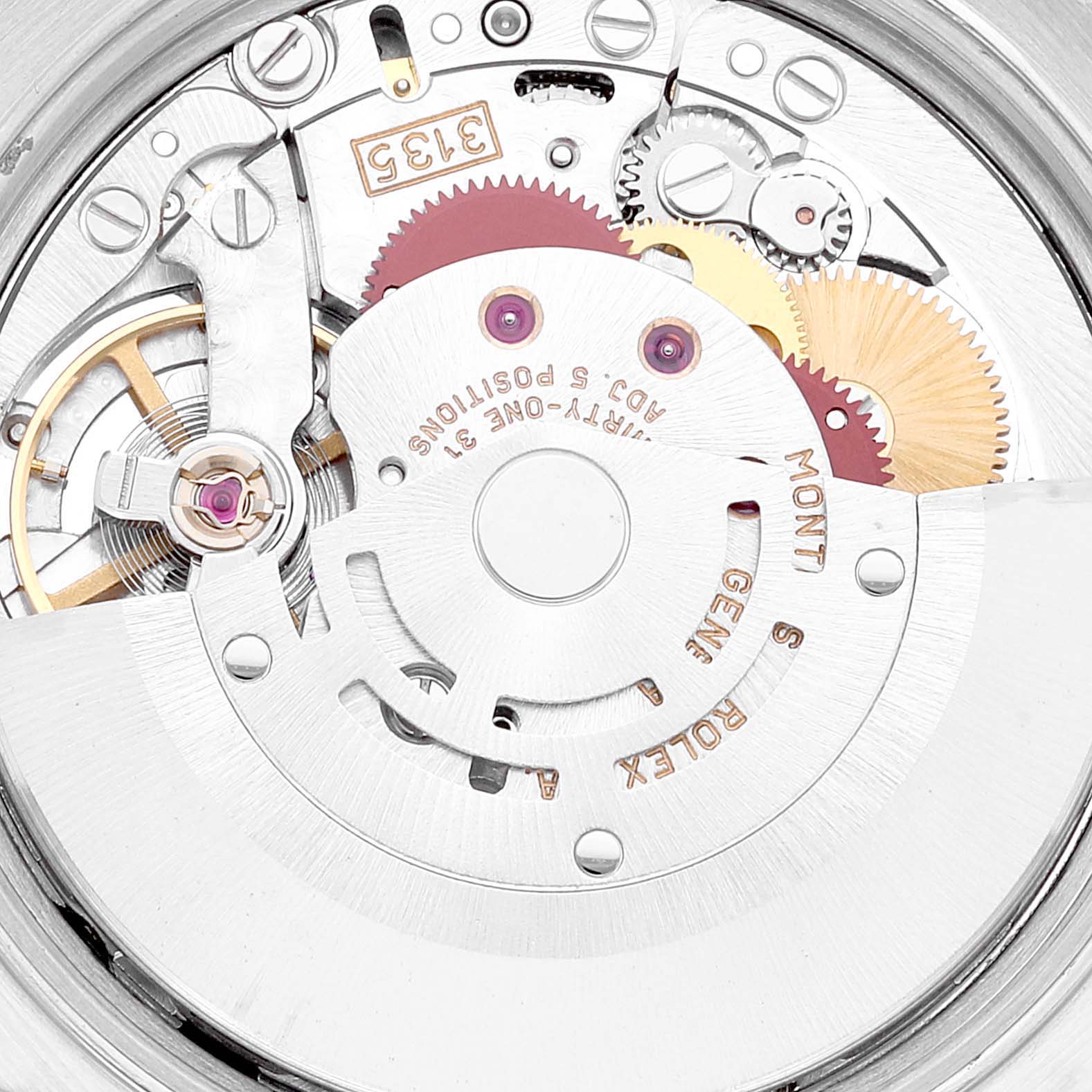 This image shows the intricate movement mechanism and internal gears of a Rolex Date 15210 Men's Stainless Steel White Dial 15210 Men's Stainless Steel White Dial model watch.