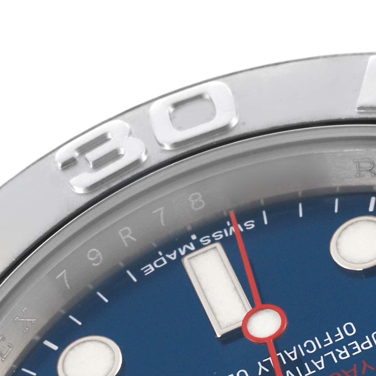 The image shows a close-up of the bezel and dial of a Rolex Yacht-Master 116622 Men's Stainless Steel Blue Dial 116622 Men's Stainless Steel Blue Dial watch, highlighting the "30" marker and part of the face.