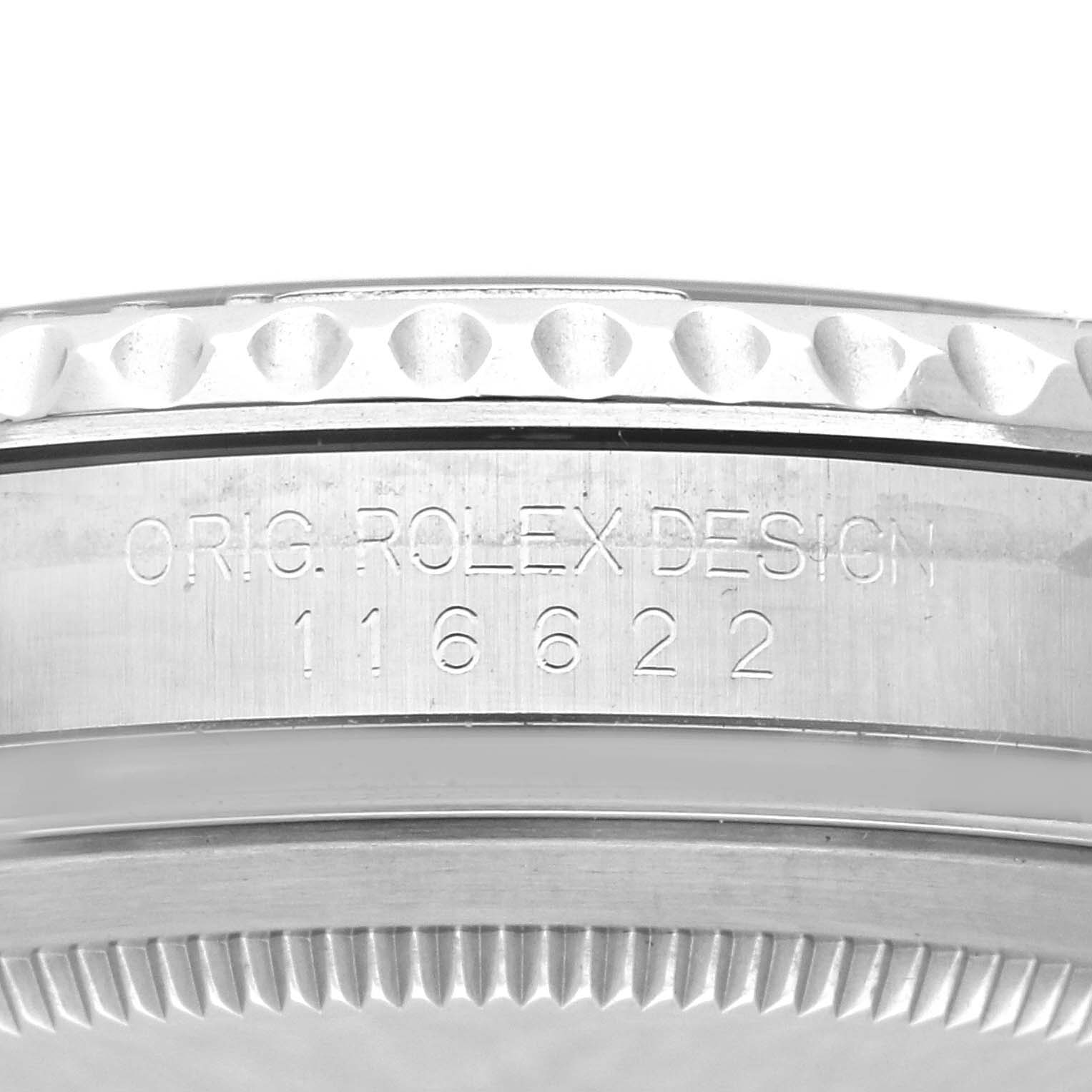 The image shows a side view of the Rolex Yacht-Master 116622 Men's Stainless Steel Blue Dial 116622 Men's Stainless Steel Blue Dial's case, highlighting the engravings on the bezel edge.