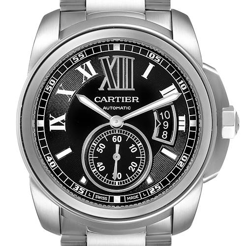 The image shows a front view of a Calibre de Cartier watch by Cartier, highlighting its dial, hands, date window, and part of the bracelet.