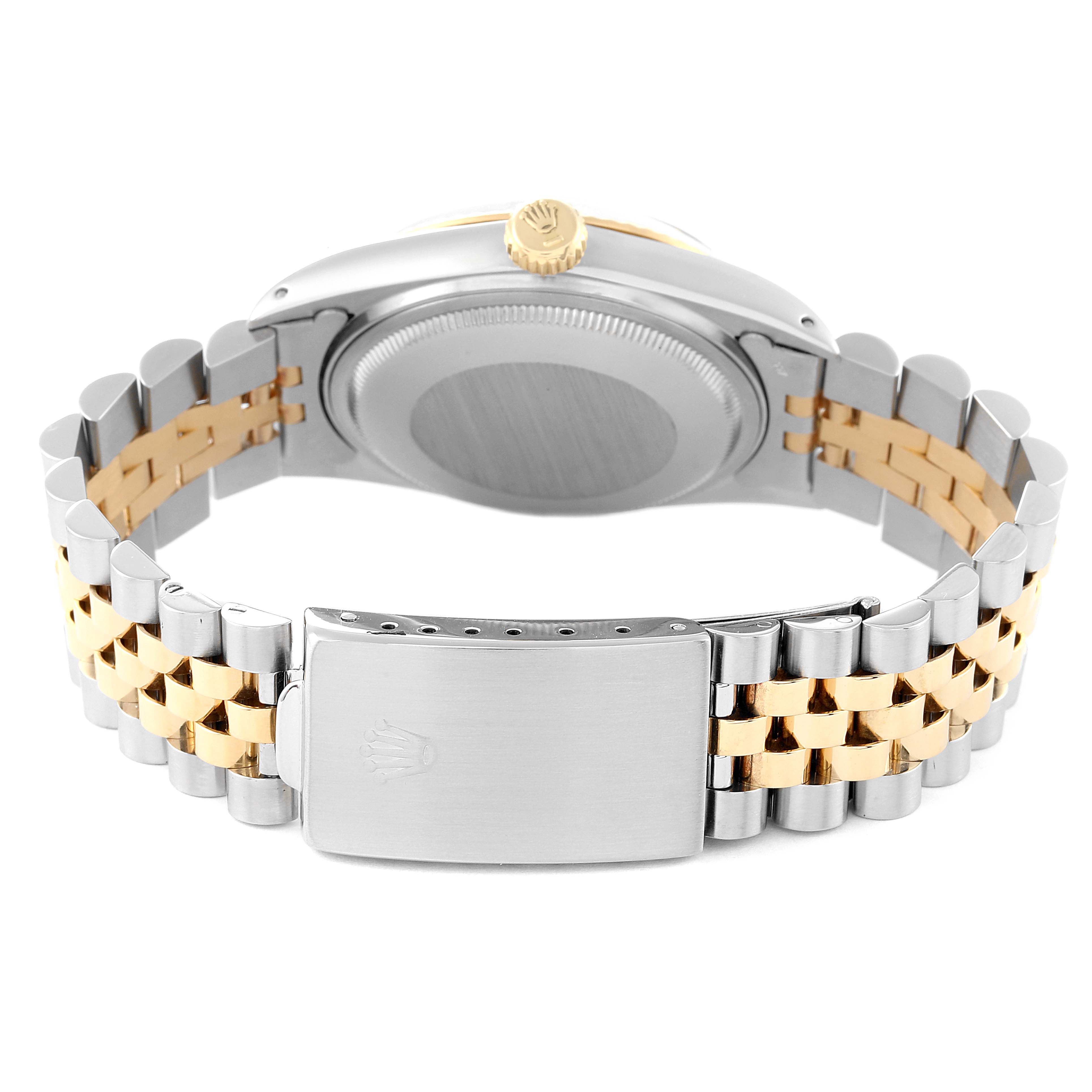 The image shows the back of a Rolex Vintage Collection 16013 Men's Steel and Gold (two tone) Champagne Dial 16013 Men's Steel and Gold (two tone) Champagne Dial watch, focusing on the case back, crown, and two-tone bracelet.