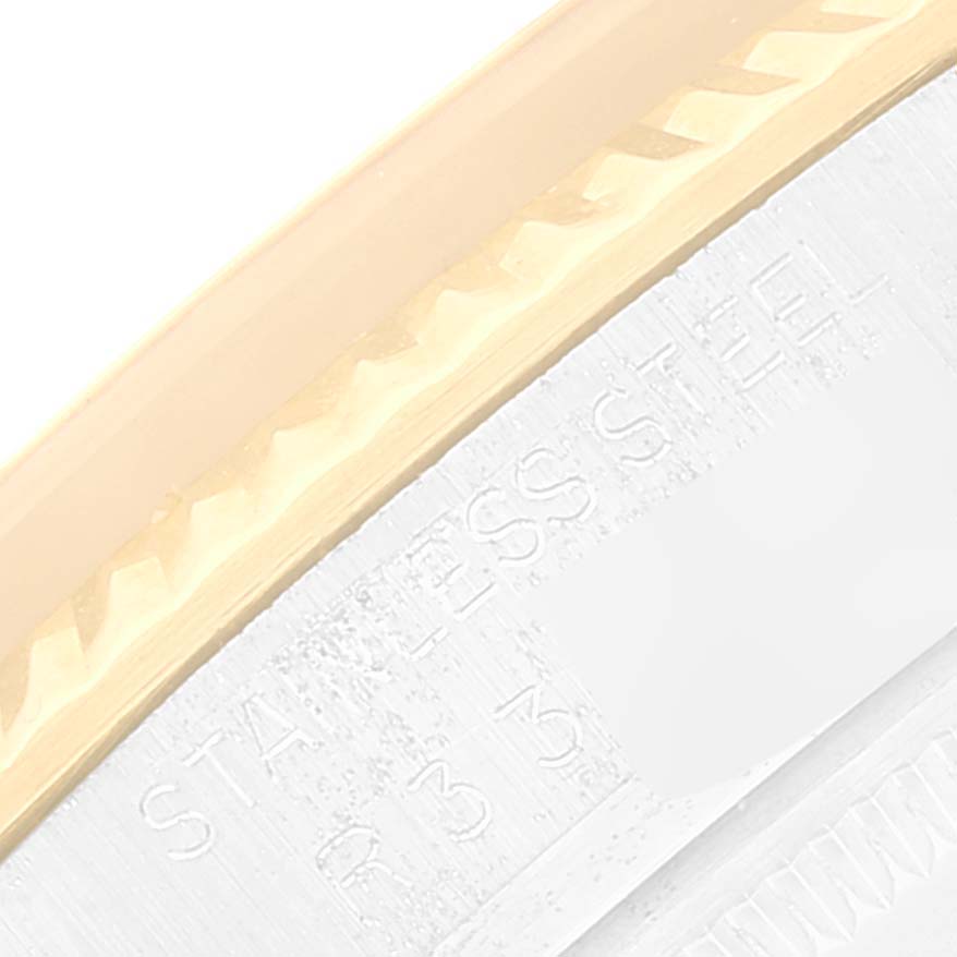 This close-up image shows the side bezel and caseback of a Rolex Vintage Collection 16013 Men's Steel and Gold (two tone) Champagne Dial 16013 Men's Steel and Gold (two tone) Champagne Dial model watch.