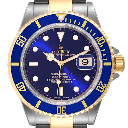 This is a close-up of a Rolex Submariner 16613 Men's Steel and Gold (two tone) Blue Dial 16613 Men's Steel and Gold (two tone) Blue Dial watch, showcasing the dial, bezel, hands, date, and part of the bracelet.