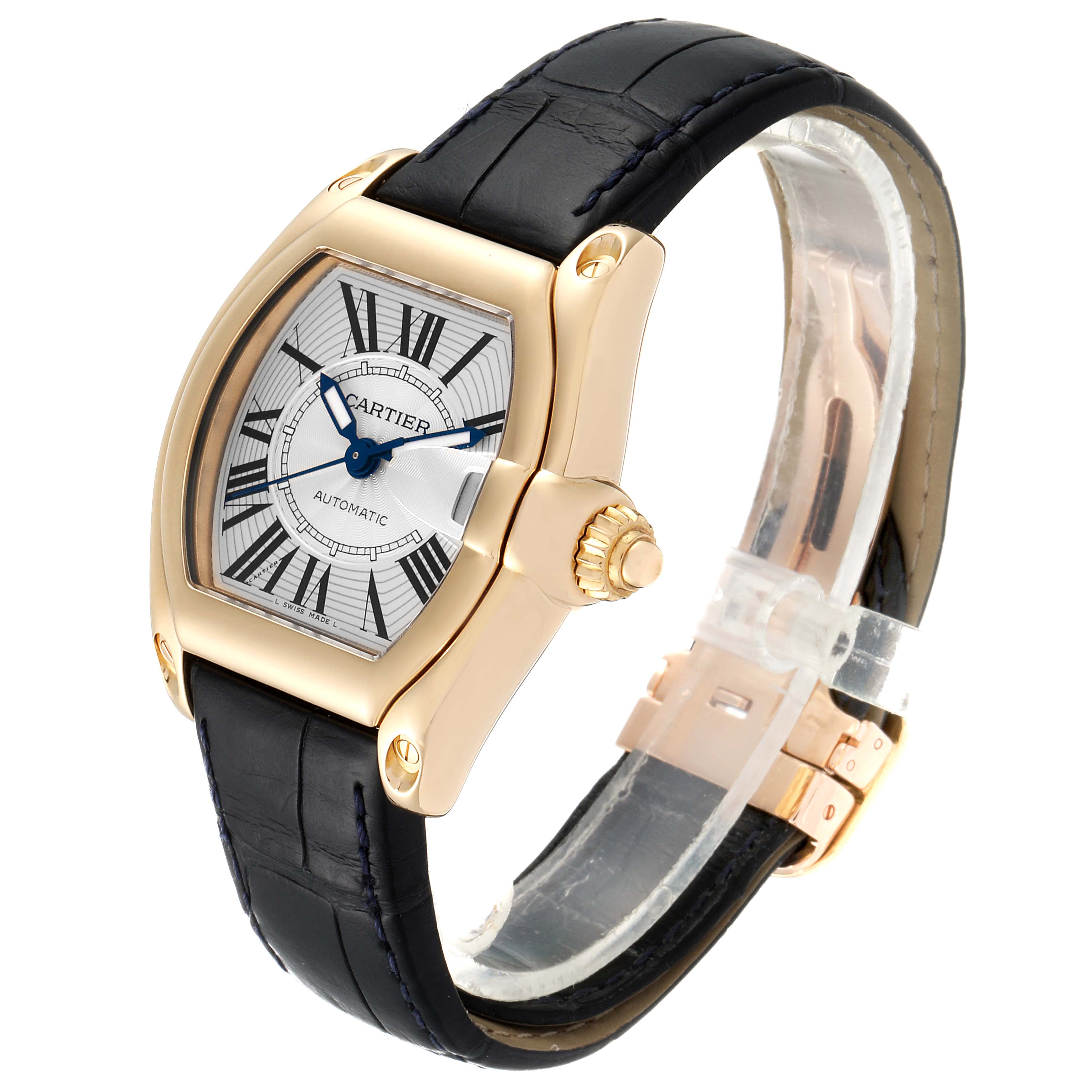 The image shows a three-quarter angle view of the Cartier Roadster W62005V2 Men's Yellow Gold Silver Dial W62005V2 Men's Yellow Gold Silver Dial watch, highlighting its gold case, black leather strap, and Roman numeral dial.