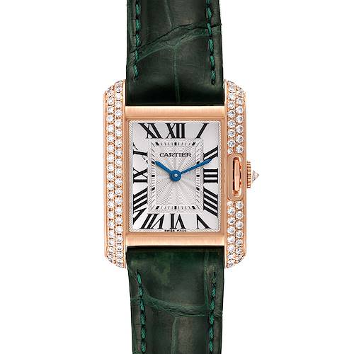 The Cartier Tank Anglaise WT100013 Women's Rose Gold Silver Dial WT100013 Women's Rose Gold Silver Dial watch is shown from a top-down angle, highlighting its face, green strap, and diamond-encrusted bezel.