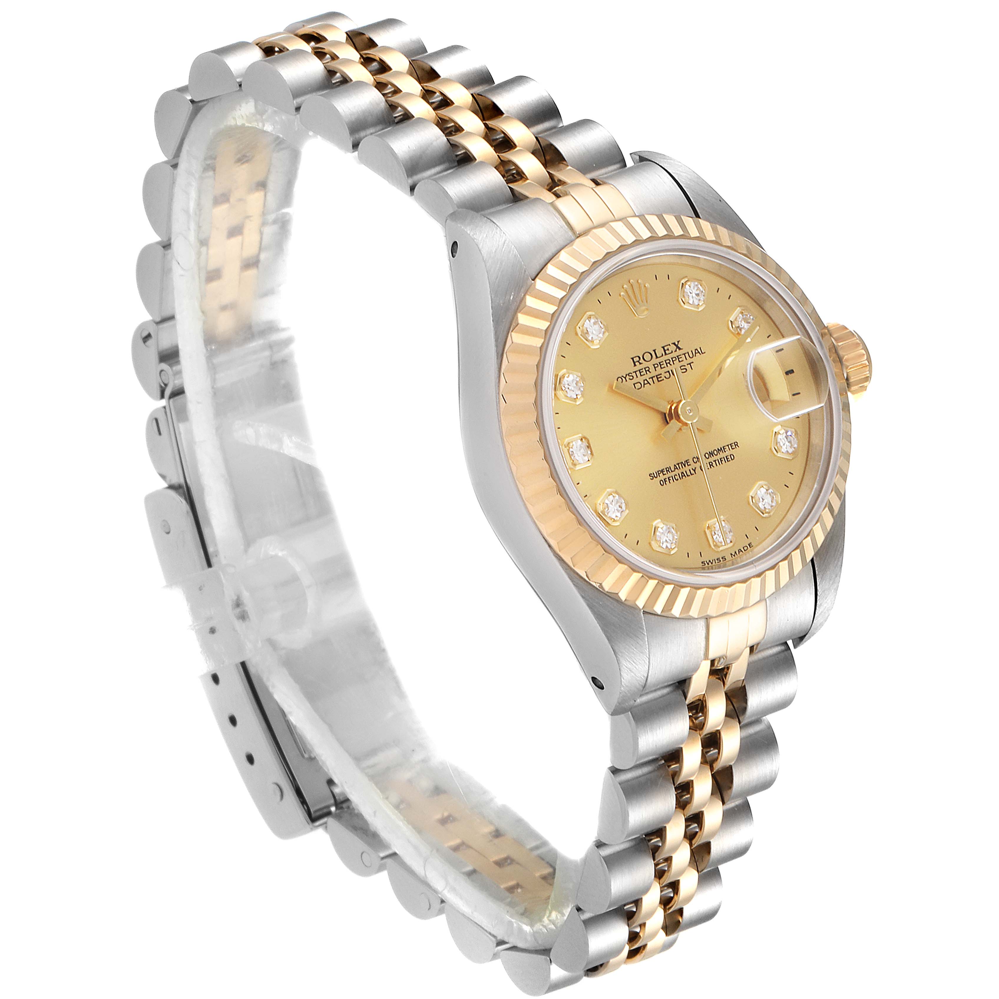 This Rolex Datejust 69173 Women's Steel and Gold (two tone) Champagne Dial 69173 Women's Steel and Gold (two tone) Champagne Dial watch is shown from a slightly elevated side angle, highlighting its face, bezel, and Jubilee bracelet.