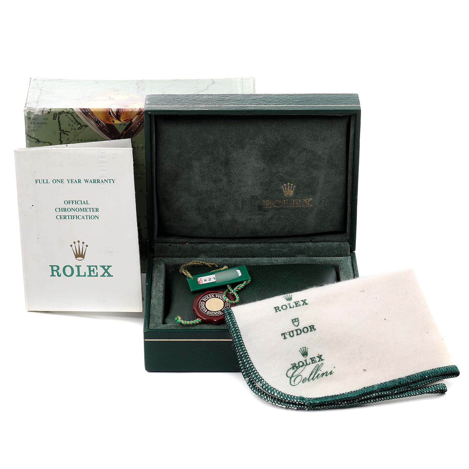 This image shows accessories for a Rolex Datejust 69173 Women's Steel and Gold (two tone) Champagne Dial 69173 Women's Steel and Gold (two tone) Champagne Dial watch, including a box, warranty card, tags, and a cleaning cloth.
