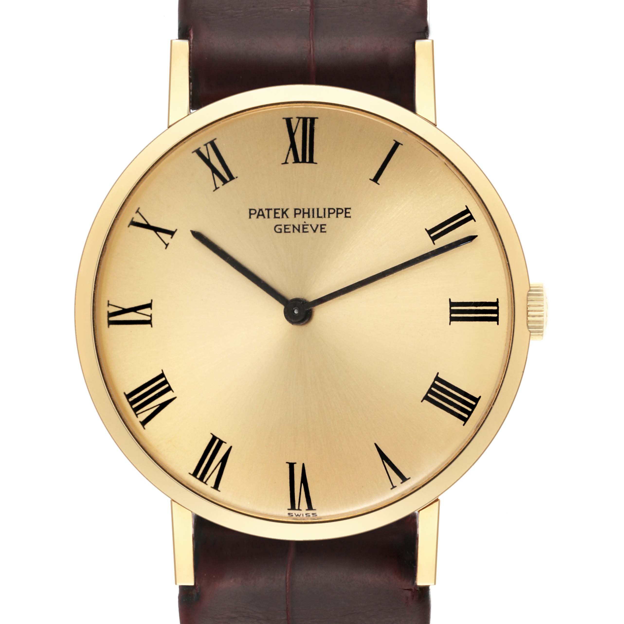 This image shows a front view of the Patek Philippe Calatrava 3537 Men's Yellow Gold Champagne Dial 3537 Men's Yellow Gold Champagne Dial wristwatch with a gold case and Roman numeral markers.