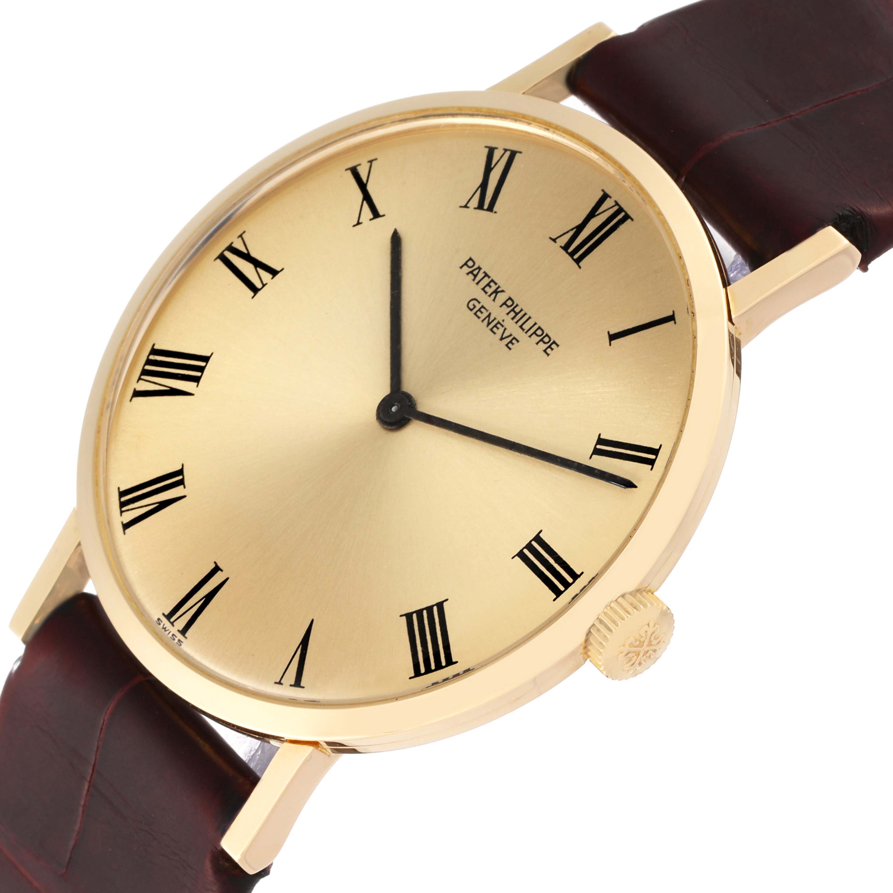 This image shows a close-up angled view of a Patek Philippe Calatrava 3537 Men's Yellow Gold Champagne Dial 3537 Men's Yellow Gold Champagne Dial watch, displaying the dial, hands, case, and strap.