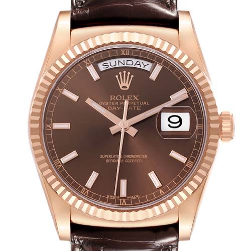 The Rolex President 118135 Men's Rose Gold Brown Dial 118135 Men's Rose Gold Brown Dial model is shown from a front angle, highlighting the dial, bezel, and crown.