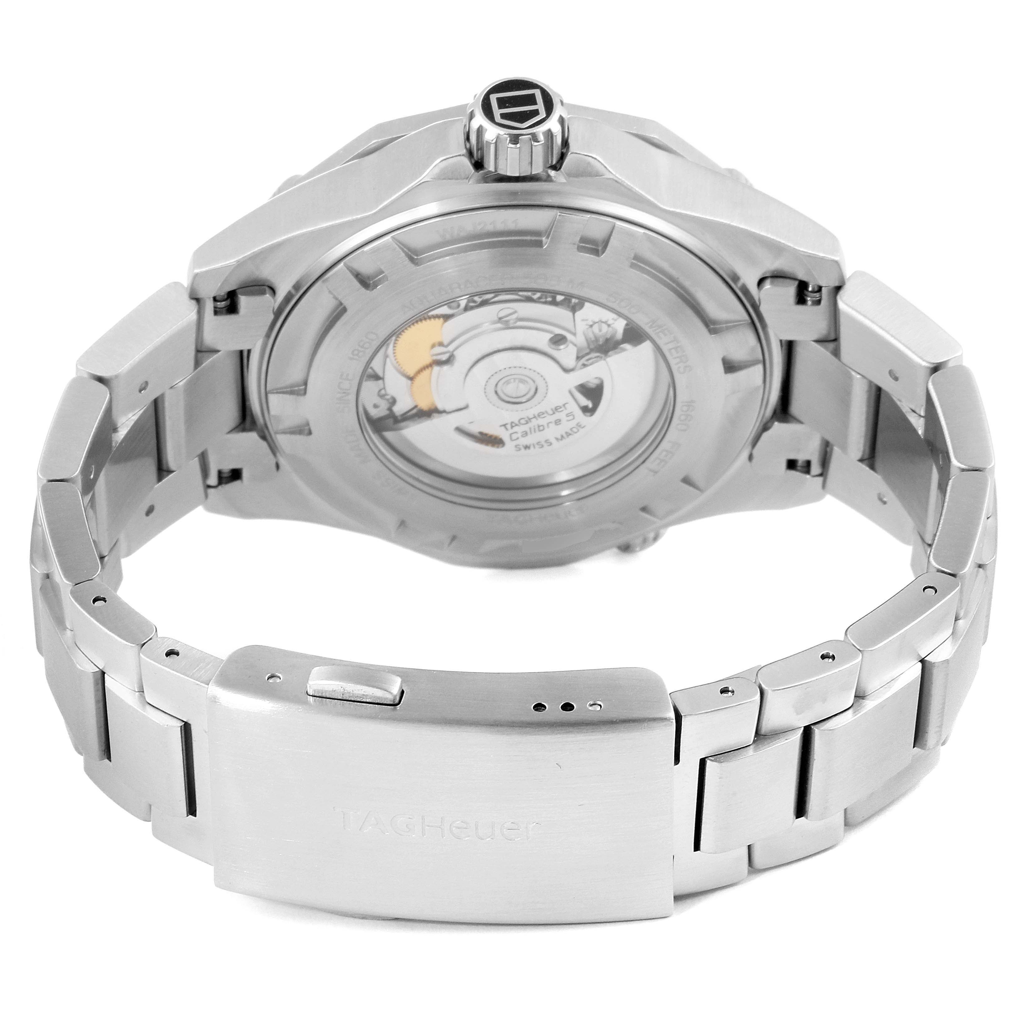 The image shows the back view of the Tag Heuer Aquaracer WAJ2111.BA0870 Men's Stainless Steel Grey Dial WAJ2111.BA0870 Men's Stainless Steel Grey Dial watch, highlighting its automatic movement and metal bracelet.