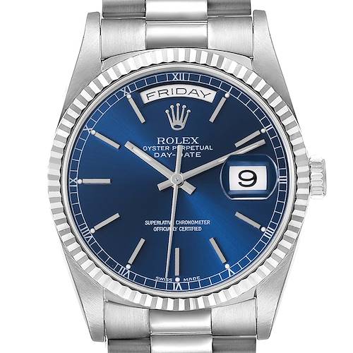 The Rolex President 18239 Men's White Gold Blue Dial 18239 Men's White Gold Blue Dial model watch is shown in a close-up front view, displaying its blue dial, day, date functions, and fluted bezel.
