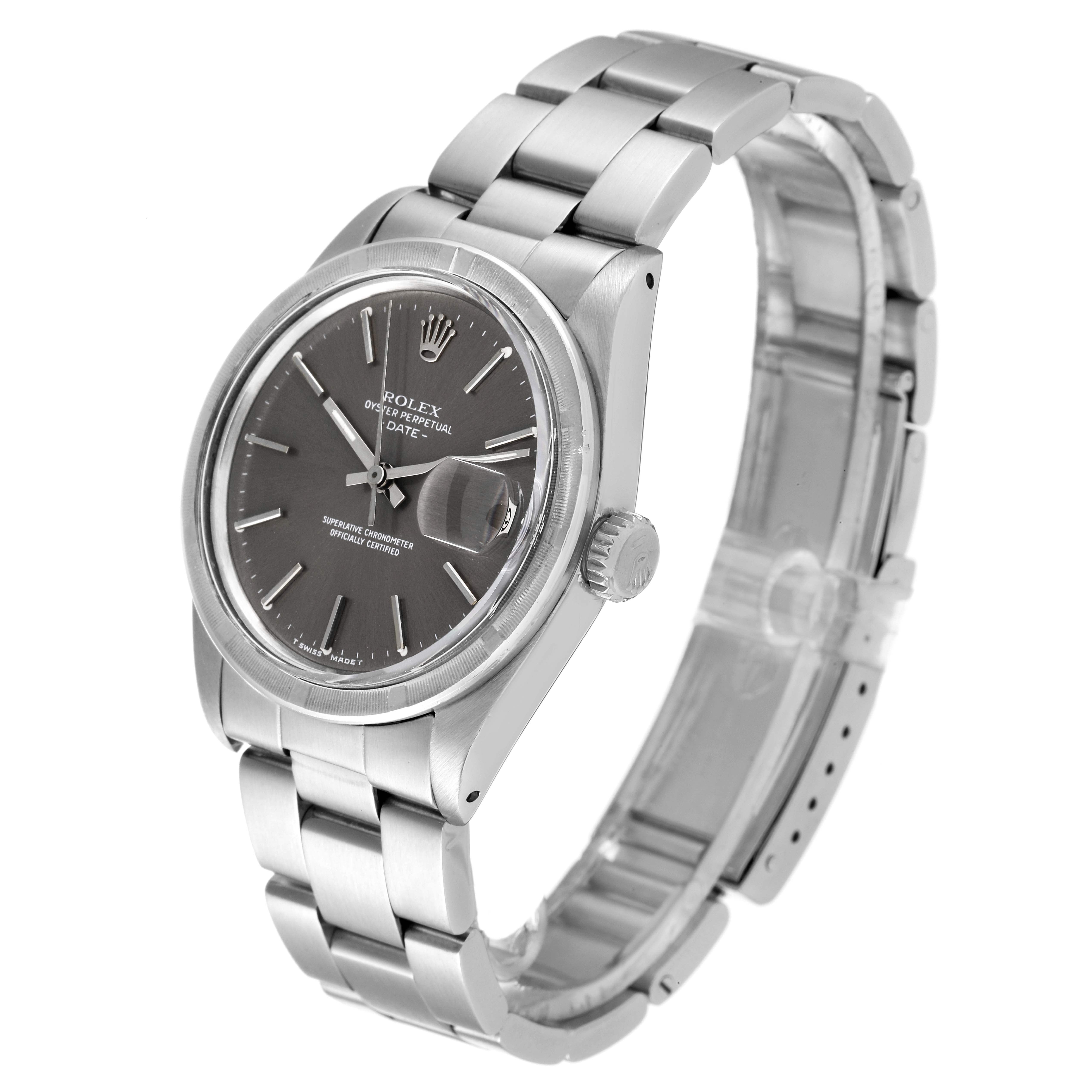 The Rolex Date 1501 Men's Stainless Steel Grey Dial 1501 Men's Stainless Steel Grey Dial model watch is shown at an angled front view highlighting its dial, case, bezel, and partially open bracelet.