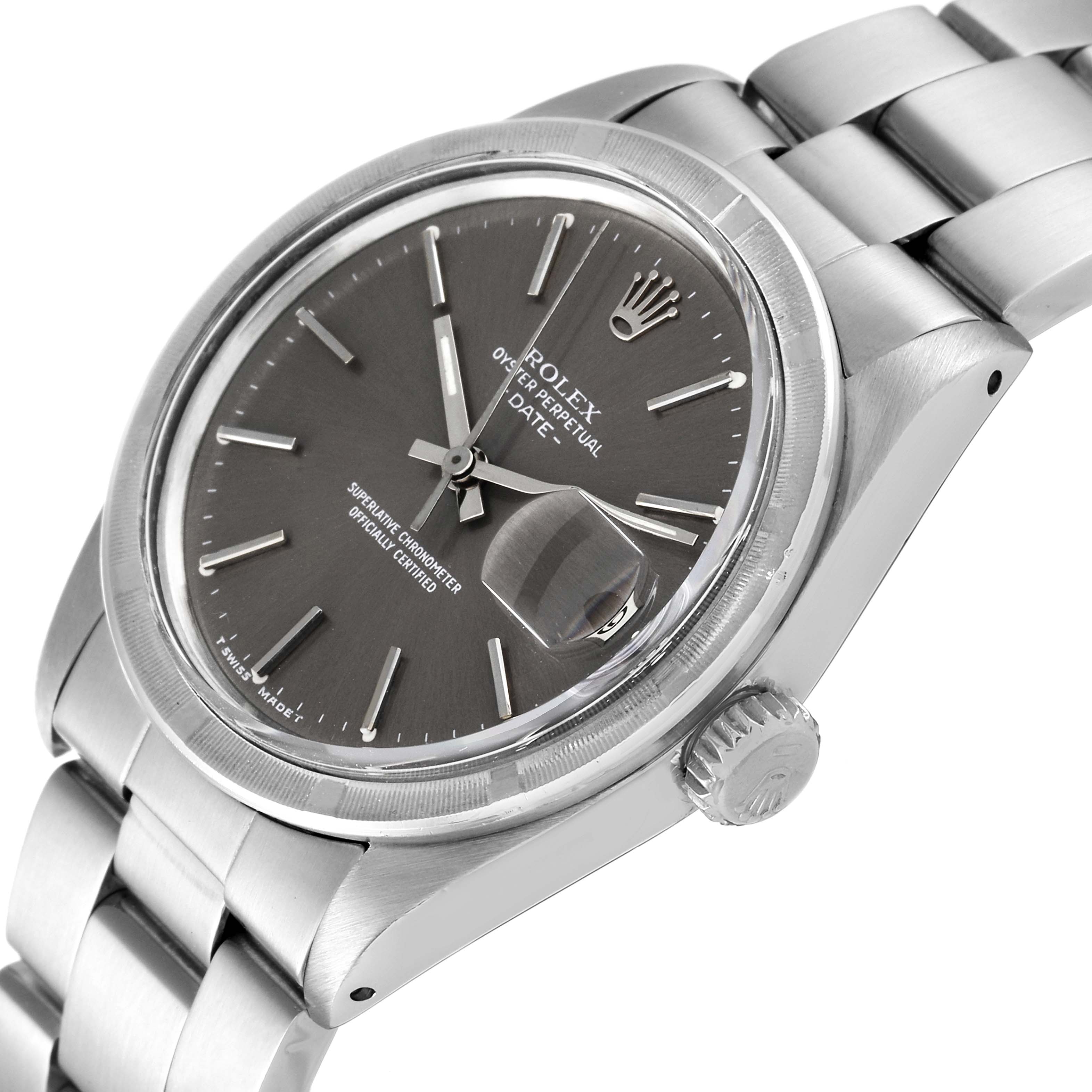 The image shows a close-up of a Rolex Date 1501 Men's Stainless Steel Grey Dial 1501 Men's Stainless Steel Grey Dial model watch, highlighting the face, crown, and part of the bracelet from an angled perspective.