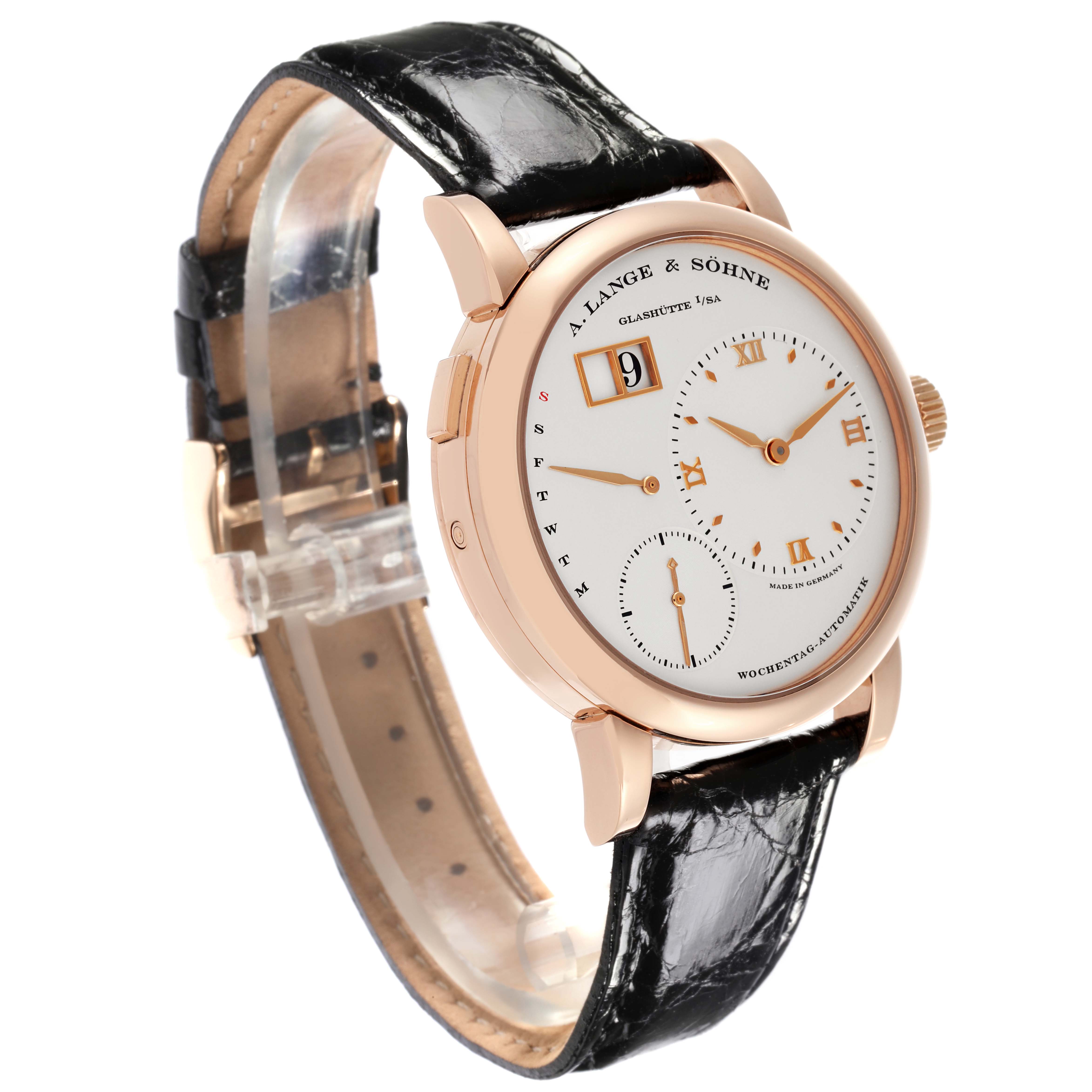 The Lange 1 by A. Lange & Sohne is shown at a three-quarter angle, displaying the dial, case, and leather strap.